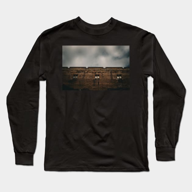 The walls of Bamburgh Castle Long Sleeve T-Shirt by chiaravisuals